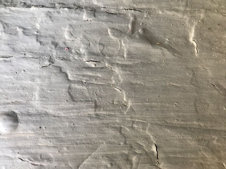 Foundation wall around a basement window opening that has been enlarged