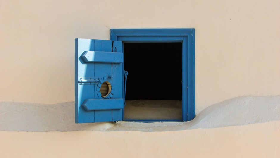 Casement-style egress window installed in a basement wall