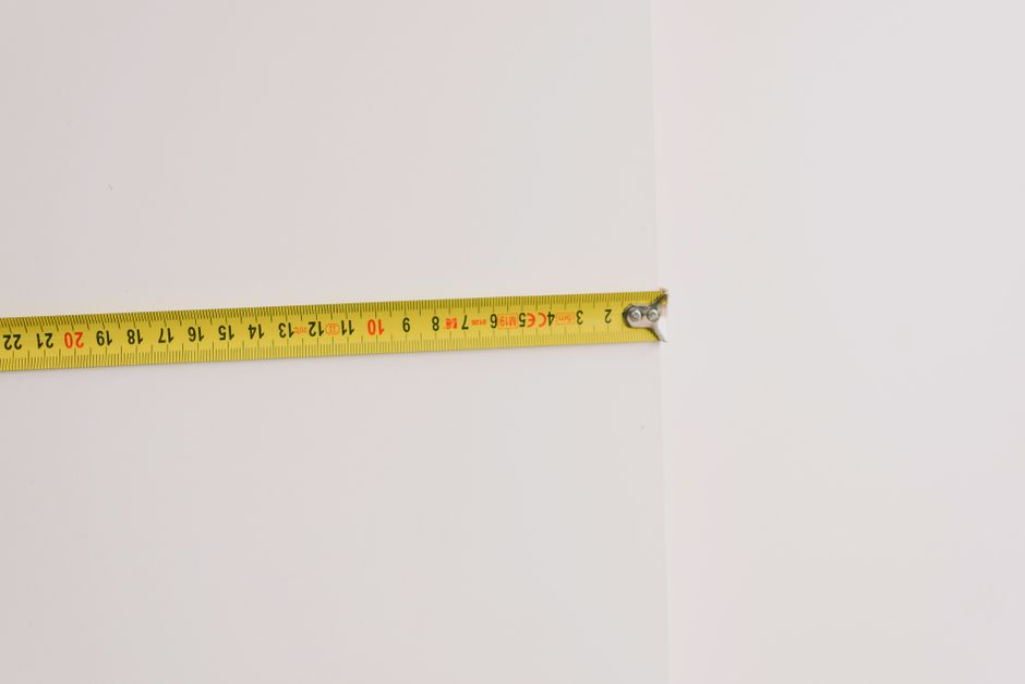 A window well measured against Wisconsin's minimum width and projection dimensions